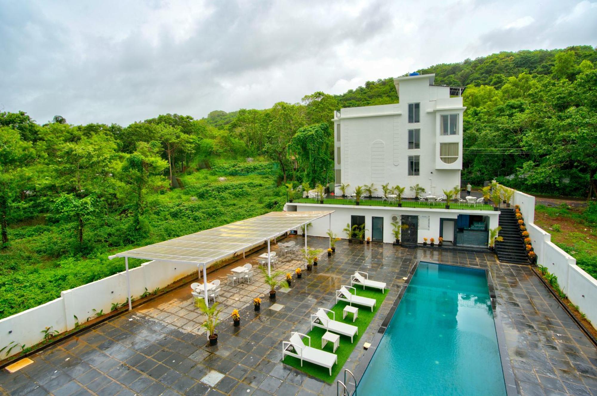 Hotel Goa Courtyard By The Porto Arpora à Baga Extérieur photo